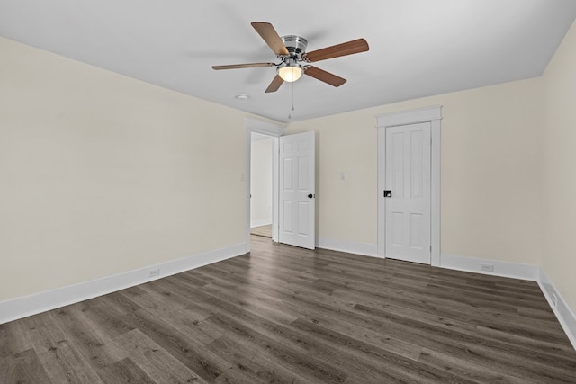 unfurnished bedroom with dark hardwood / wood-style flooring and ceiling fan