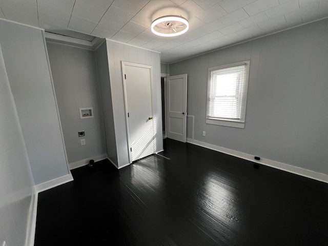 empty room featuring dark hardwood / wood-style flooring