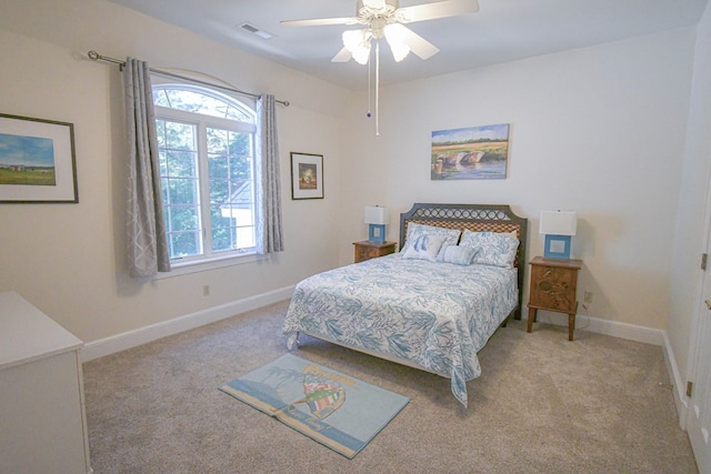 carpeted bedroom featuring ceiling fan