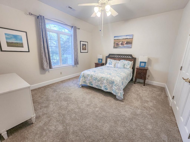 bedroom with light carpet and ceiling fan