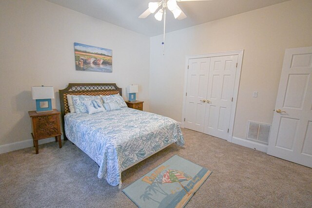 bedroom featuring carpet flooring, ceiling fan, and a closet