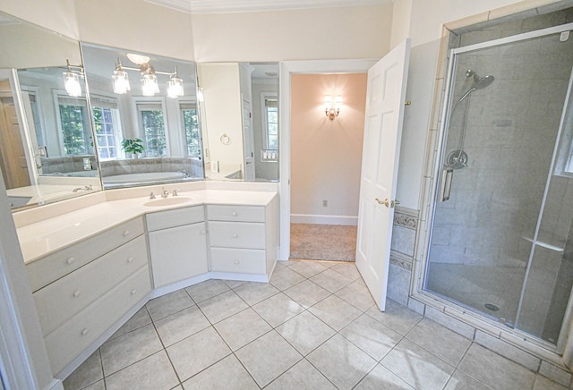 bathroom with crown molding, tile patterned floors, a shower with door, and vanity