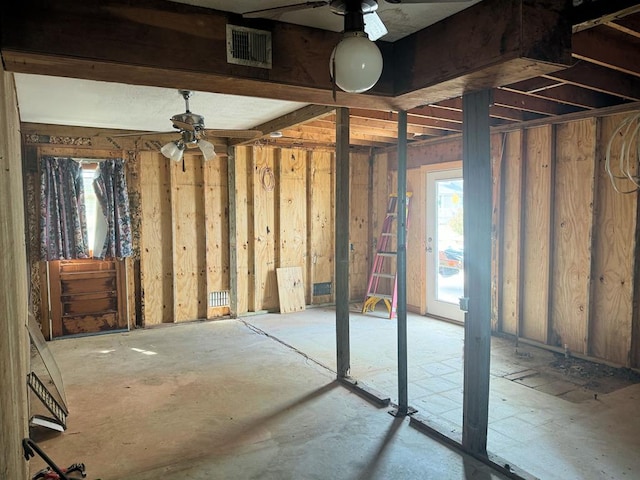 misc room with ceiling fan and a wealth of natural light