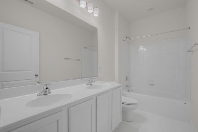 full bathroom with tile patterned floors, vanity, toilet, and tub / shower combination