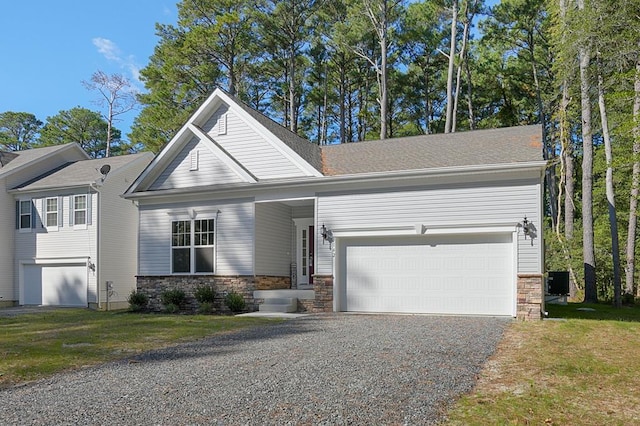 view of front of house featuring a front yard and central AC unit