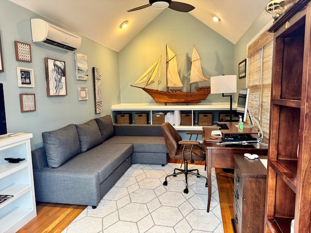 office area with lofted ceiling, light wood-style flooring, a ceiling fan, and a wall mounted air conditioner