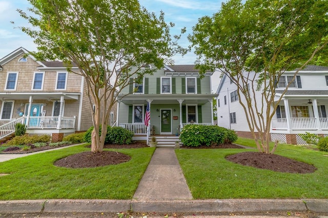 view of front facade with a porch and a front yard