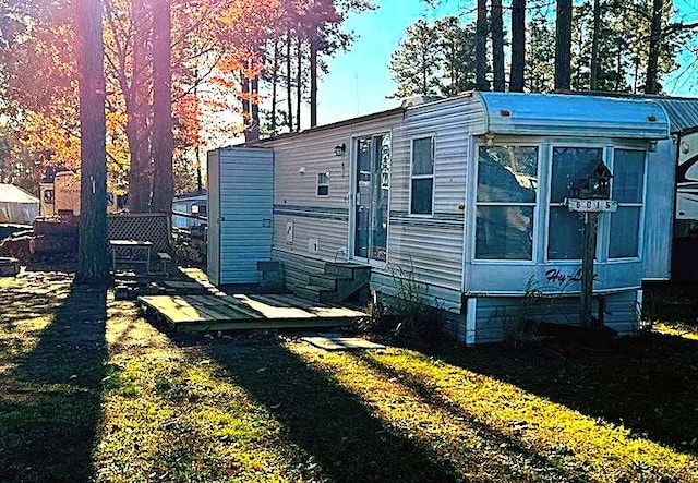 exterior space with a yard