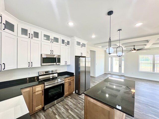 37734 Blue Crab Cir, Painter, VA 23420 - kitchen featuring ceiling fan, wood finished floors, stainless steel appliances, recessed lighting, and white cabinetry