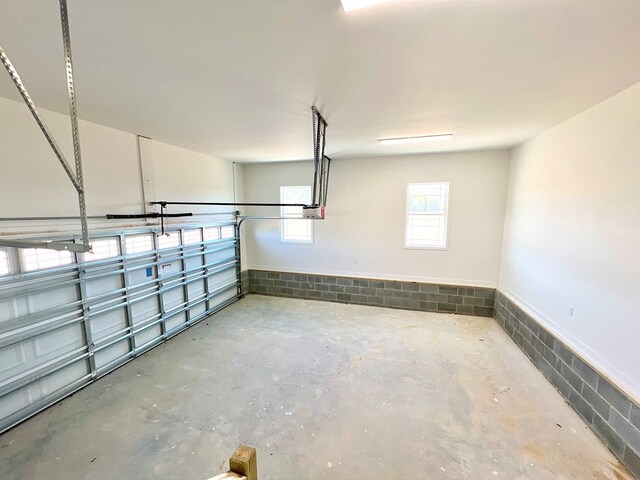 37734 Blue Crab Cir, Painter, VA 23420 - garage featuring a garage door opener