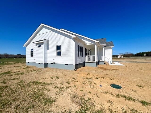 37734 Blue Crab Cir, Painter, VA 23420 - view of side of property with crawl space and a porch