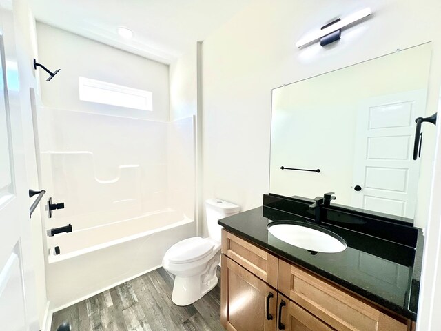 37734 Blue Crab Cir, Painter, VA 23420 - full bath featuring shower / tub combination, wood finished floors, toilet, and vanity