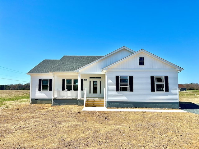 37734 Blue Crab Cir, Painter, VA 23420 - view of front facade featuring a porch, crawl space, and a shingled roof