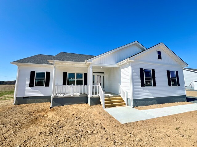 37734 Blue Crab Cir, Painter, VA 23420 - view of front of house featuring covered porch and crawl space