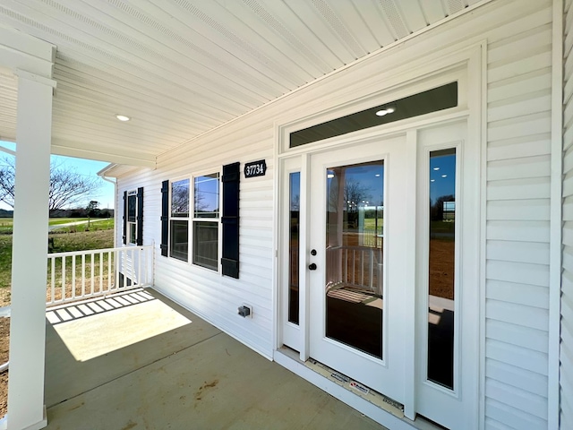 37734 Blue Crab Cir, Painter, VA 23420 - view of patio / terrace featuring covered porch