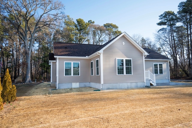 exterior space with a lawn