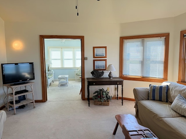 3196 Main St, Chincoteague, VA 23336 - living area featuring carpet flooring, baseboards, and a ceiling fan