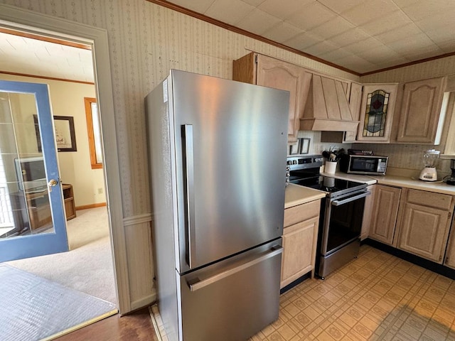 3196 Main St, Chincoteague, VA 23336 - kitchen featuring crown molding, stainless steel appliances, light countertops, and custom exhaust hood
