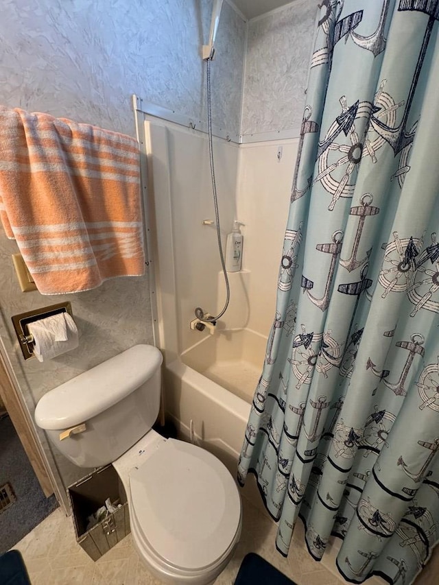 bathroom featuring toilet and shower / tub combo with curtain