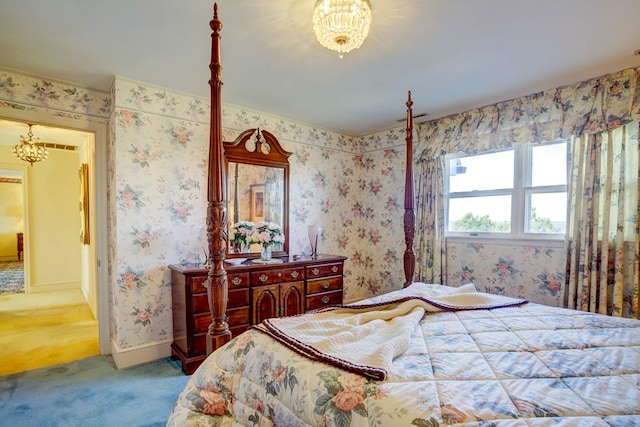 bedroom with carpet and a notable chandelier