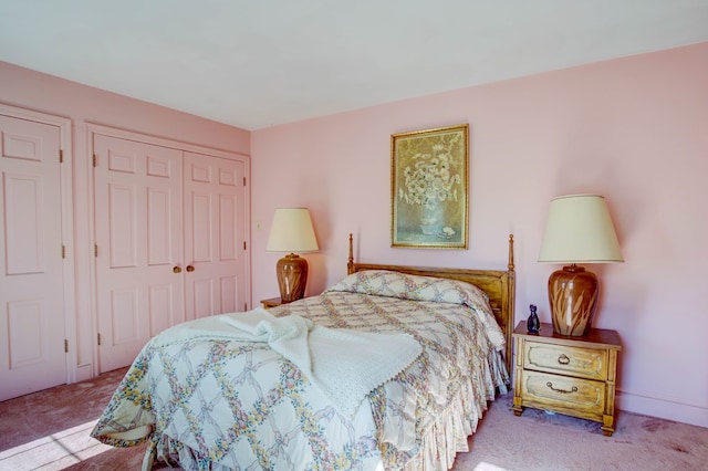 carpeted bedroom featuring a closet