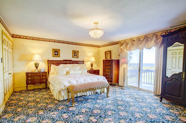 bedroom featuring carpet flooring and access to outside