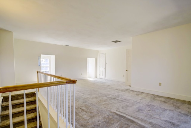 empty room featuring carpet floors