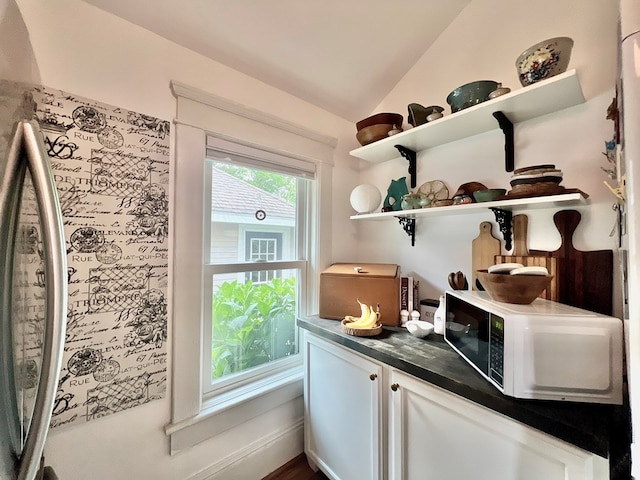 2453 Sand Hill Dr, Cape Charles, VA 23310 - bar area with white microwave and vaulted ceiling