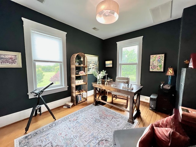 2453 Sand Hill Dr, Cape Charles, VA 23310 - home office featuring light wood-style flooring and baseboards
