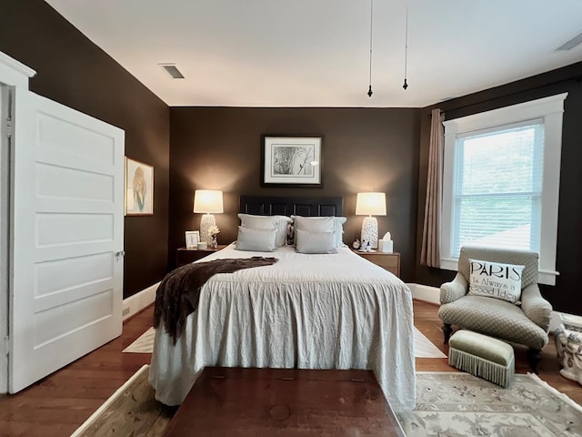 2453 Sand Hill Dr, Cape Charles, VA 23310 - bedroom featuring wood finished floors and baseboards
