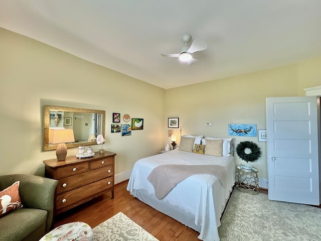 2453 Sand Hill Dr, Cape Charles, VA 23310 - bedroom featuring wood finished floors, baseboards, and ceiling fan