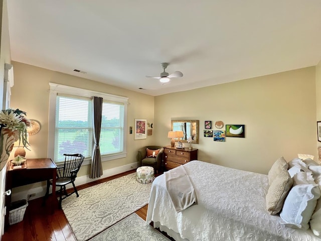 2453 Sand Hill Dr, Cape Charles, VA 23310 - bedroom featuring wood finished floors, ceiling fan, and baseboards