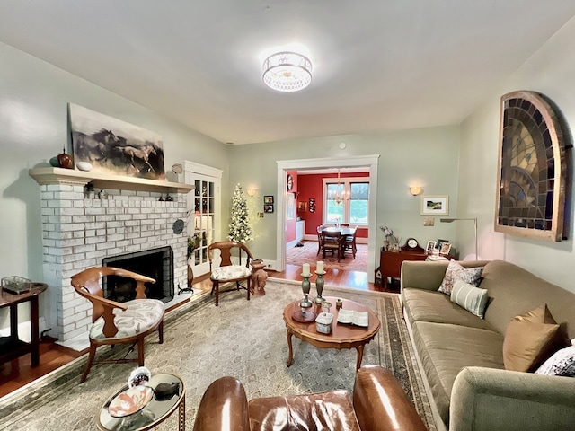 2453 Sand Hill Dr, Cape Charles, VA 23310 - living area featuring wood finished floors and a fireplace