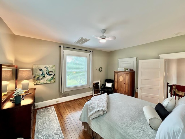 2453 Sand Hill Dr, Cape Charles, VA 23310 - bedroom featuring baseboards, wood-type flooring, and ceiling fan