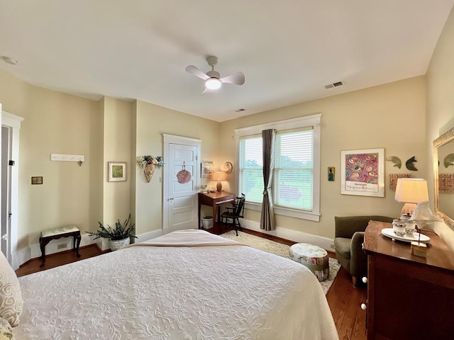 2453 Sand Hill Dr, Cape Charles, VA 23310 - bedroom with wood finished floors, baseboards, and ceiling fan