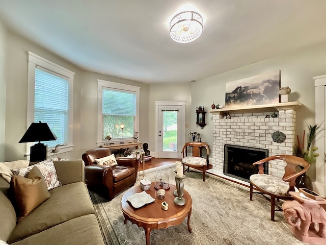 2453 Sand Hill Dr, Cape Charles, VA 23310 - living area with a fireplace and wood finished floors
