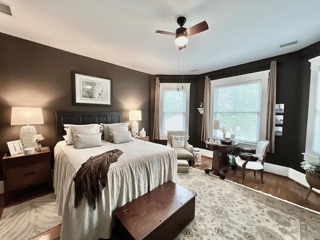 2453 Sand Hill Dr, Cape Charles, VA 23310 - bedroom with wood finished floors, baseboards, and a ceiling fan