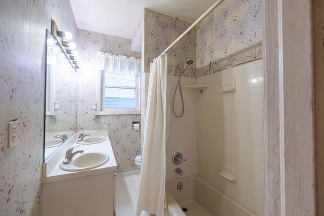205 Monroe Ave, Cape Charles, VA 23310 - bathroom featuring shower / tub combo, double vanity, and toilet