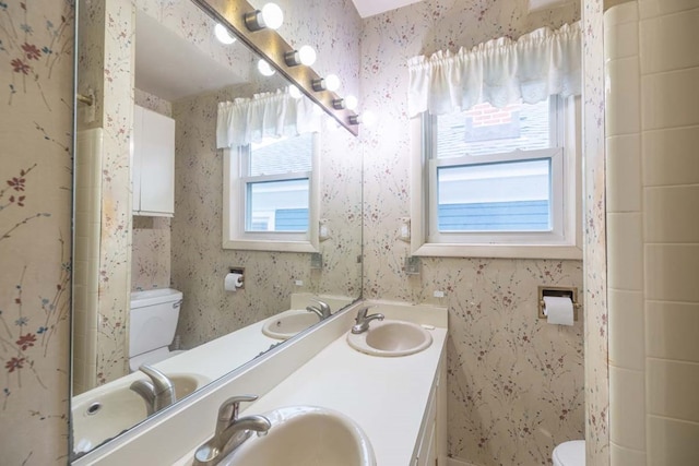 205 Monroe Ave, Cape Charles, VA 23310 - full bath with toilet, wallpapered walls, and double vanity
