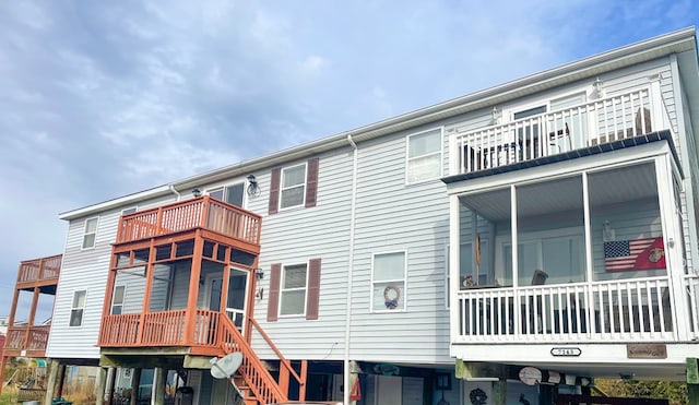 rear view of house with a balcony