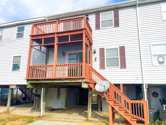 back of house with a patio