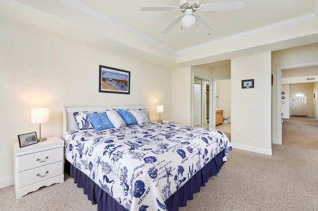 bedroom with ensuite bath, ceiling fan, crown molding, and light carpet