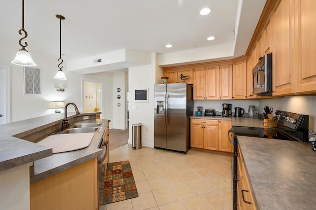 kitchen featuring sink, light tile patterned floors, pendant lighting, and appliances with stainless steel finishes