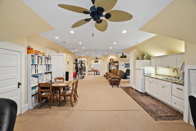 306 Bay Ave, Cape Charles, VA 23310 - carpeted dining area with a sink, recessed lighting, and ceiling fan