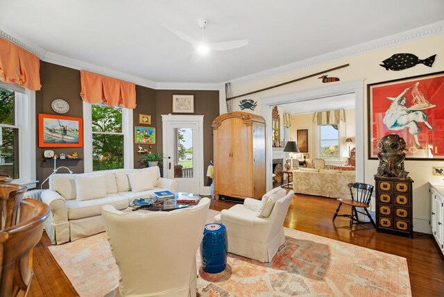 306 Bay Ave, Cape Charles, VA 23310 - living area with wood finished floors, plenty of natural light, ceiling fan, and crown molding