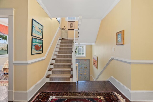 306 Bay Ave, Cape Charles, VA 23310 - staircase with wood finished floors, baseboards, and crown molding