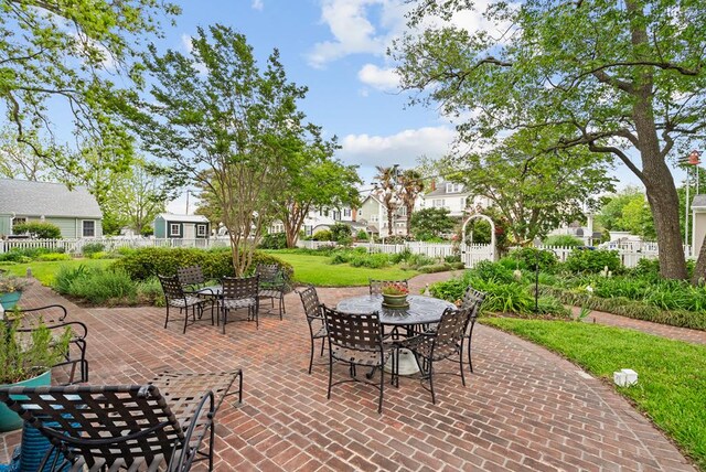 306 Bay Ave, Cape Charles, VA 23310 - view of patio / terrace with outdoor dining space and a residential view