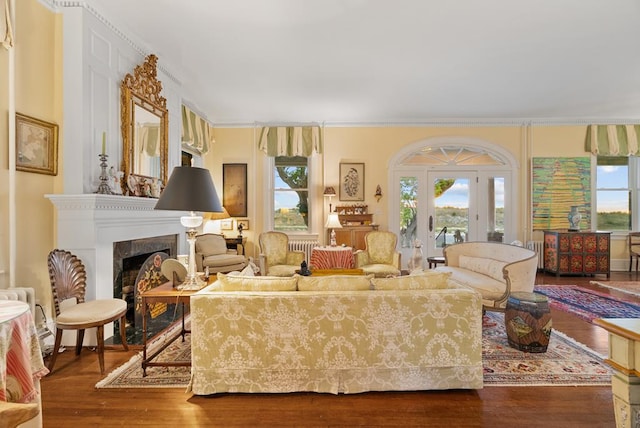 306 Bay Ave, Cape Charles, VA 23310 - living area with wood finished floors, a fireplace, and crown molding