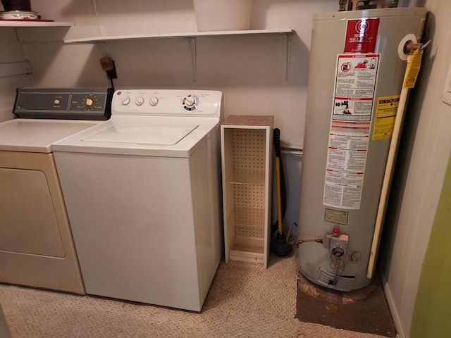 laundry area with independent washer and dryer and water heater