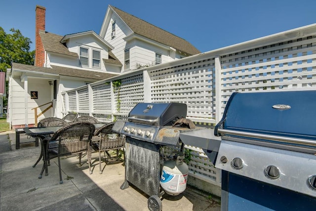 view of patio with a grill